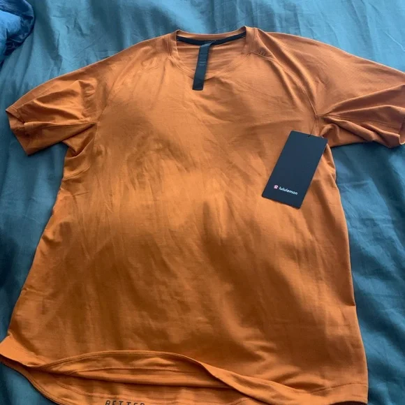 Lululemon License to Train Short Sleeve Orange Shirt Exercise Train - Picture 2 of 6